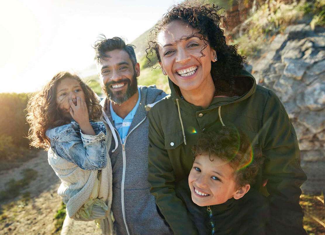 A happy family hiking together